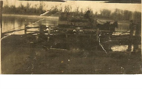 Abt 1890, Joseph Asa Jenkins loading his wagon onto ferry at Bowie County, Texas, to cross the Red River into Indian Territory